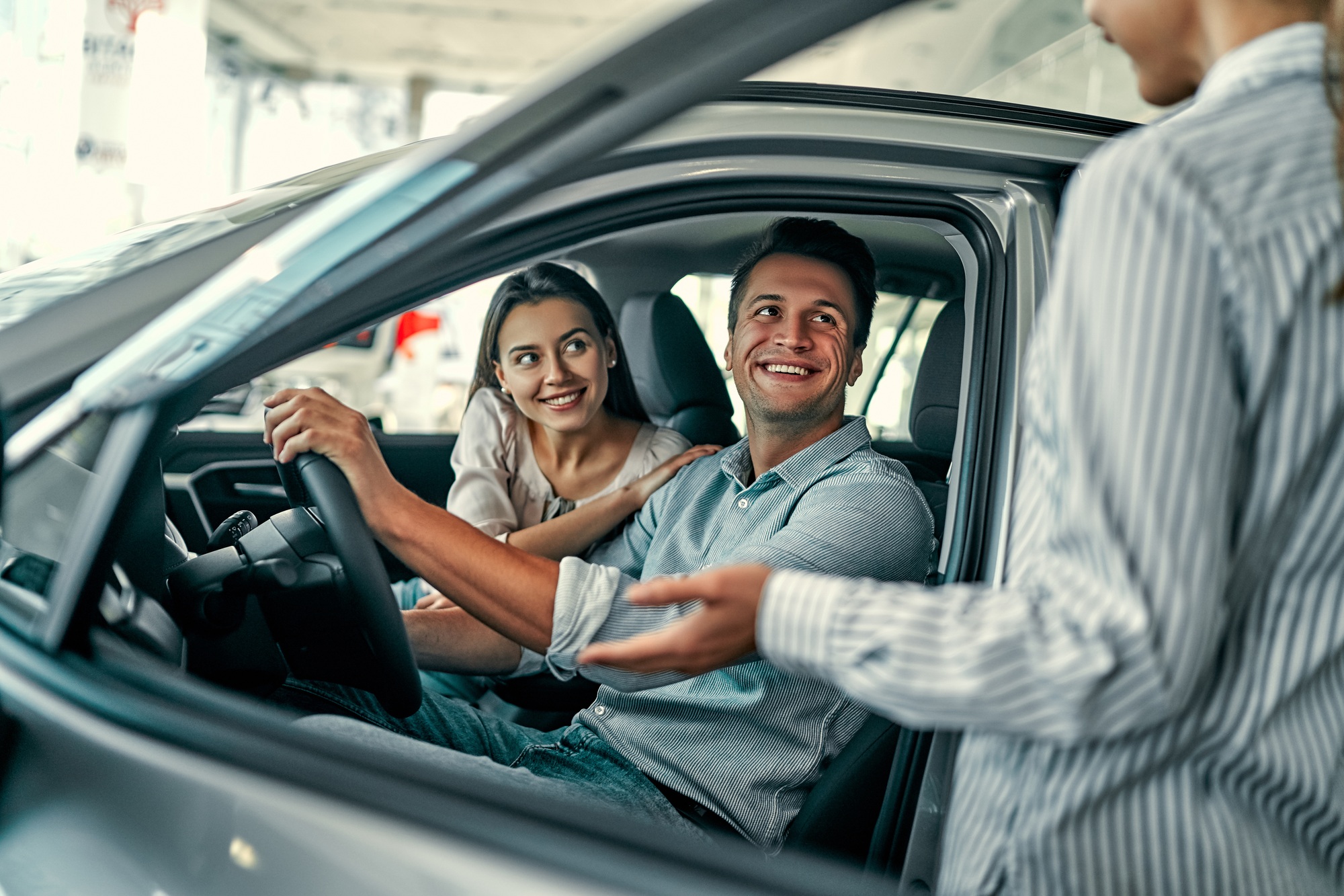 At a car dealership, buying a car
